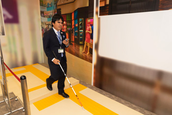 Photo4:A visually impaired person moving without tripping by using voice navigation